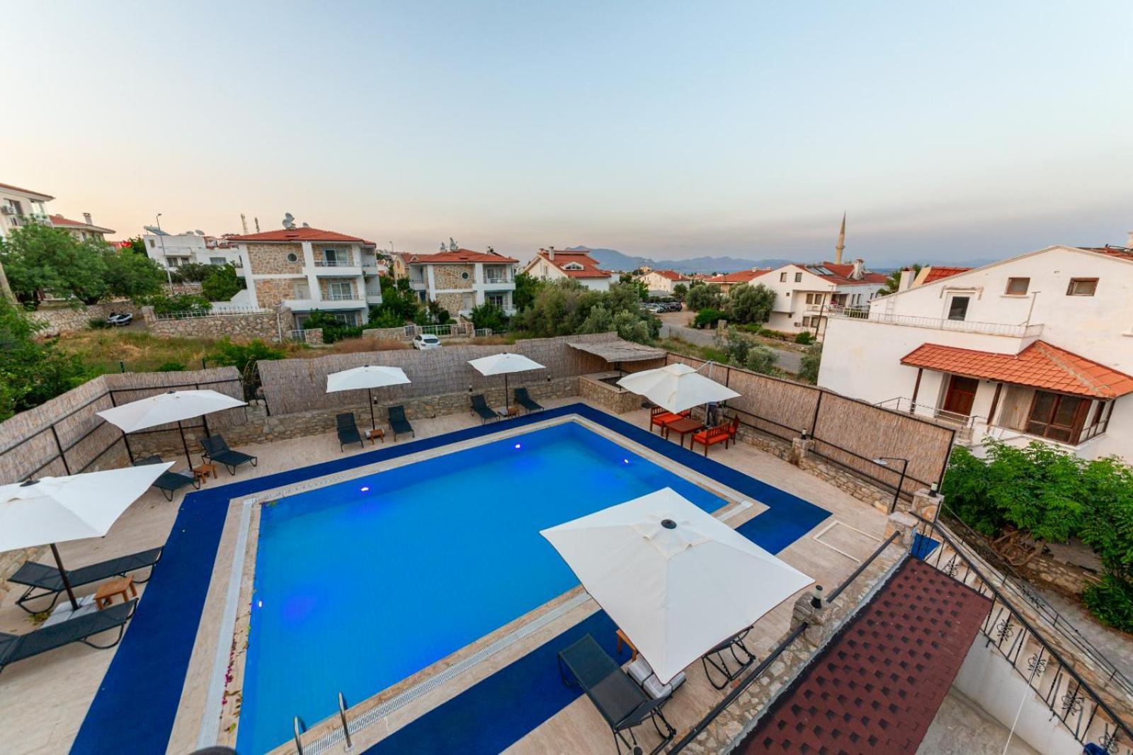 Oezguem Suite Otel Datca Bagian luar foto