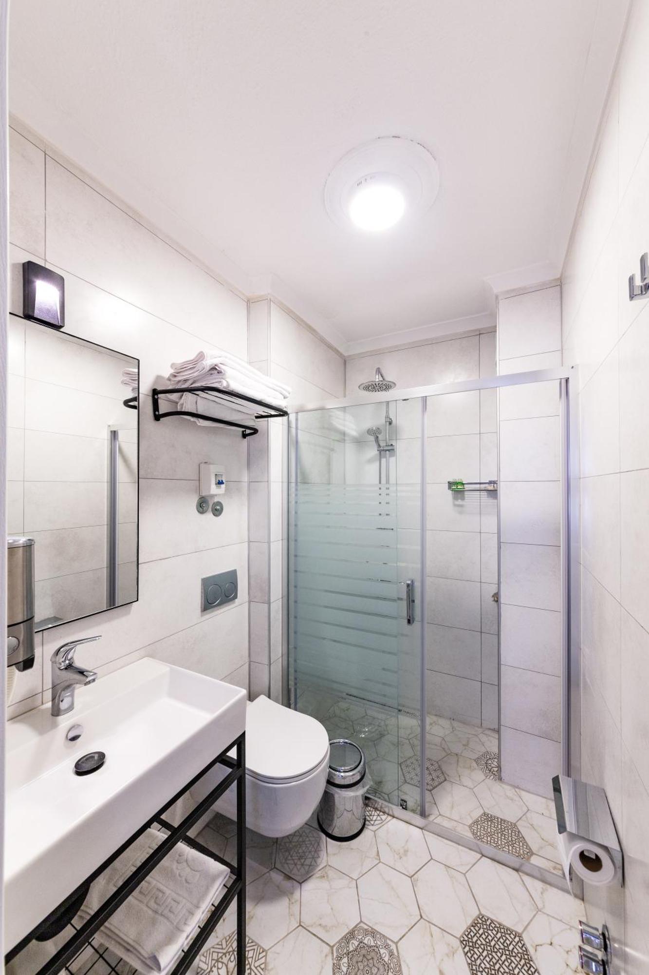 Oezguem Suite Otel Datca Bagian luar foto
