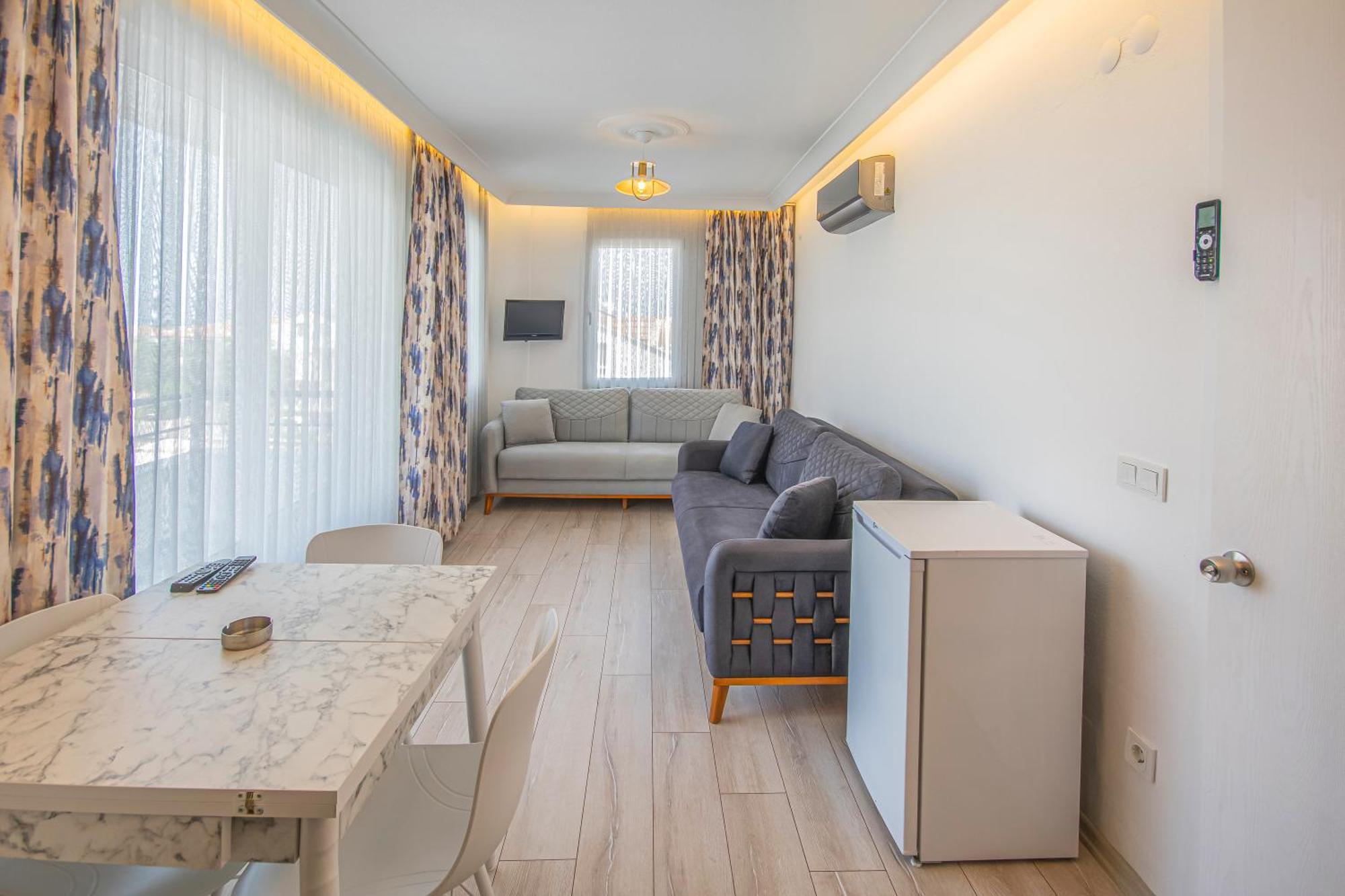 Oezguem Suite Otel Datca Bagian luar foto
