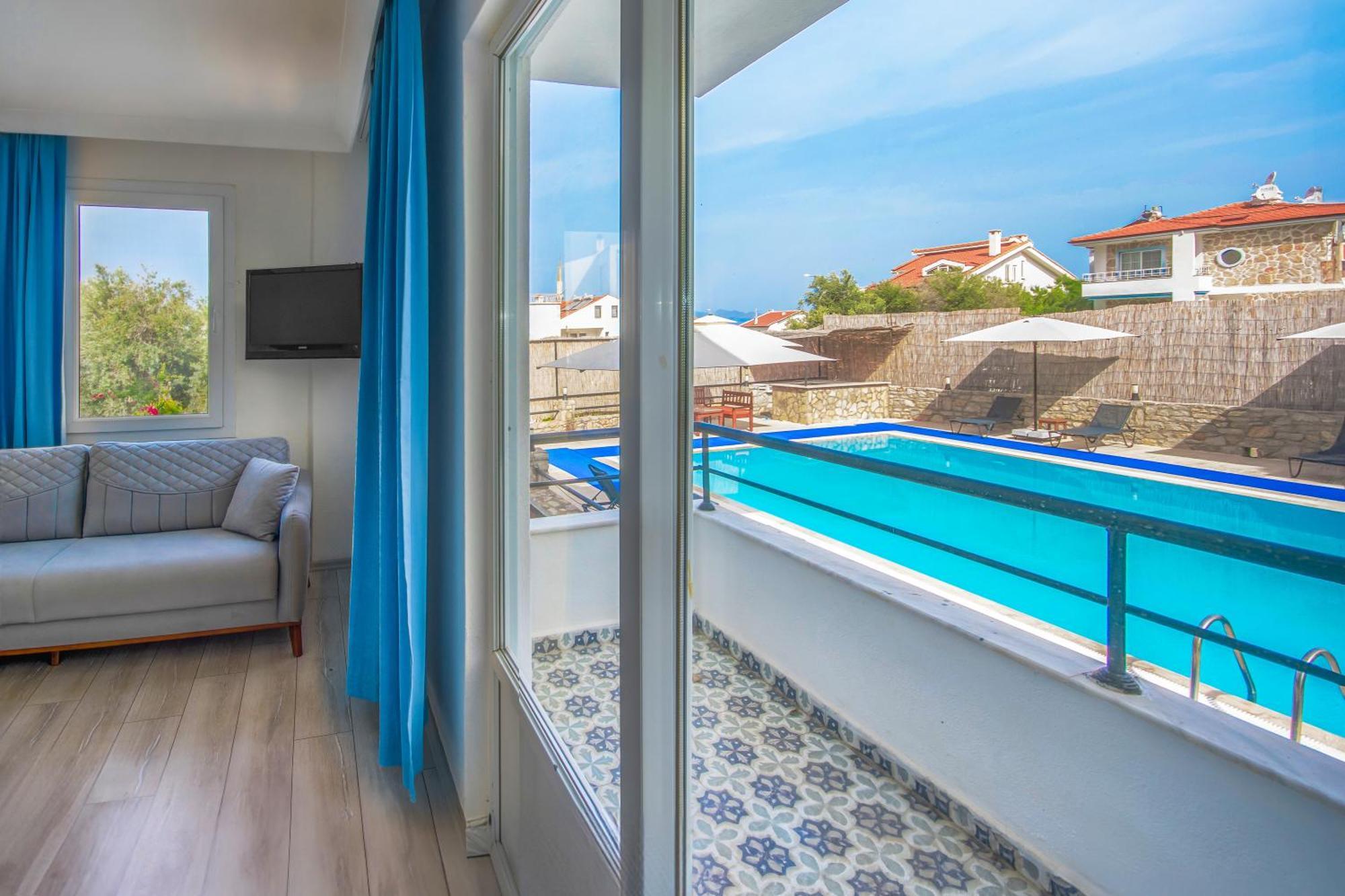 Oezguem Suite Otel Datca Bagian luar foto