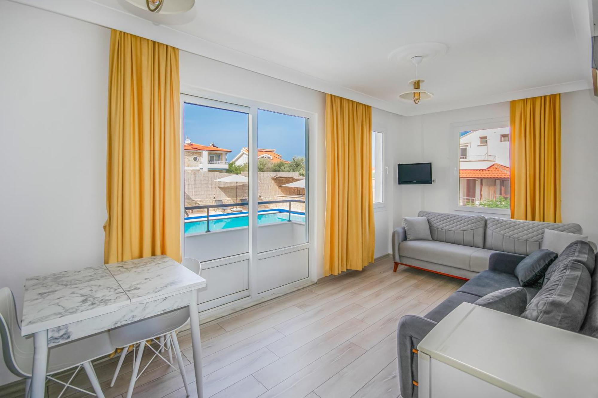 Oezguem Suite Otel Datca Bagian luar foto