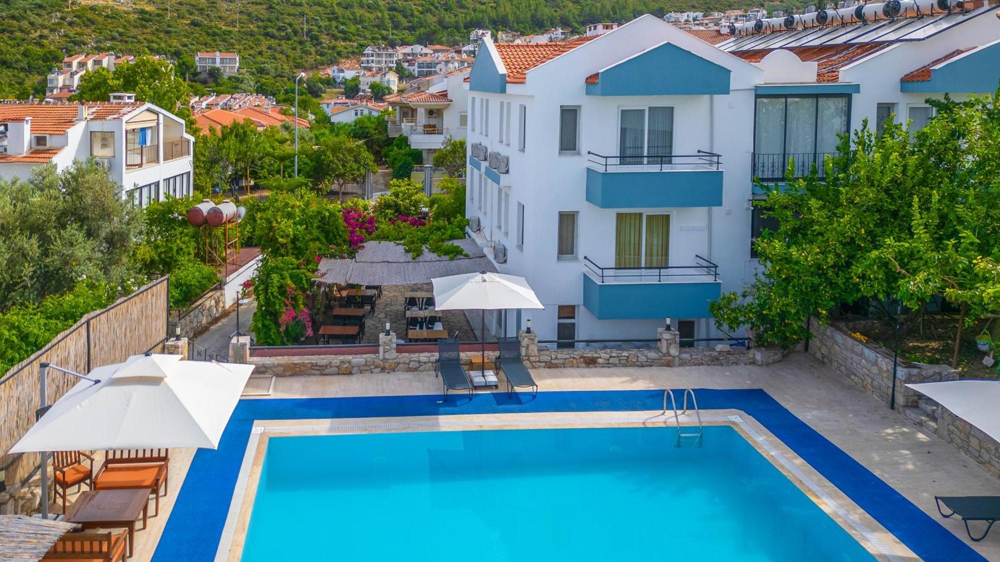Oezguem Suite Otel Datca Bagian luar foto