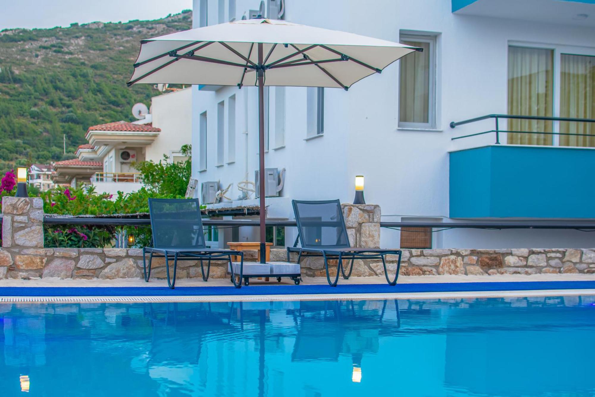 Oezguem Suite Otel Datca Bagian luar foto