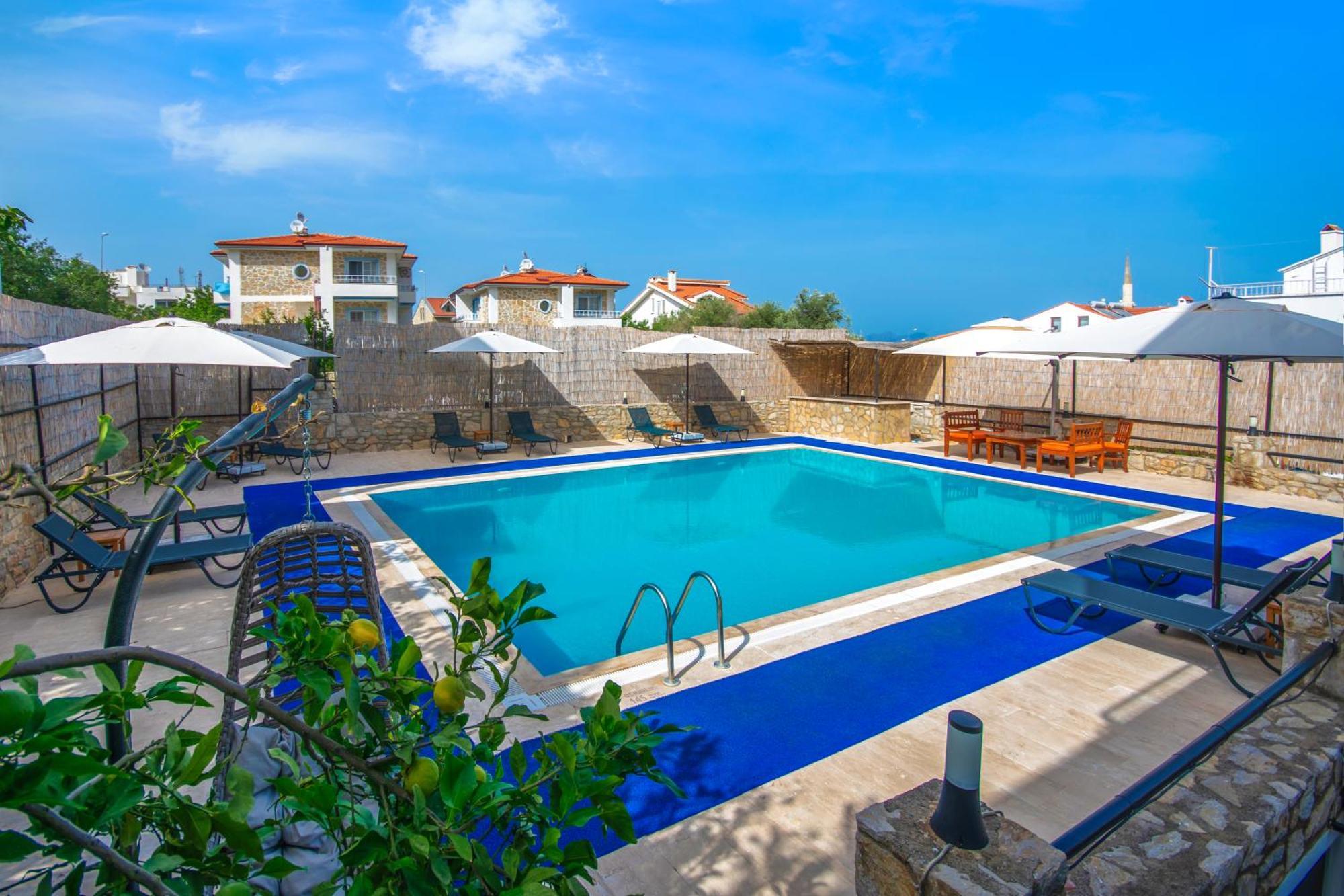 Oezguem Suite Otel Datca Bagian luar foto